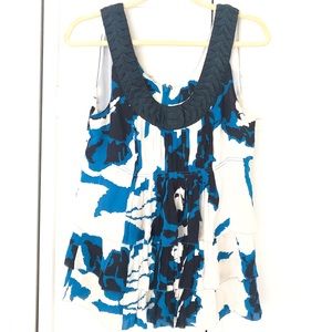 Tory Burch white and navy blue ruffle top. Size 10